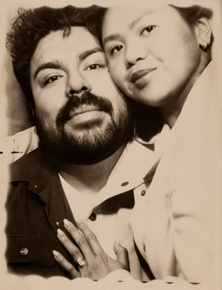 Sepia photobooth portrait of Ann and Chris smiling