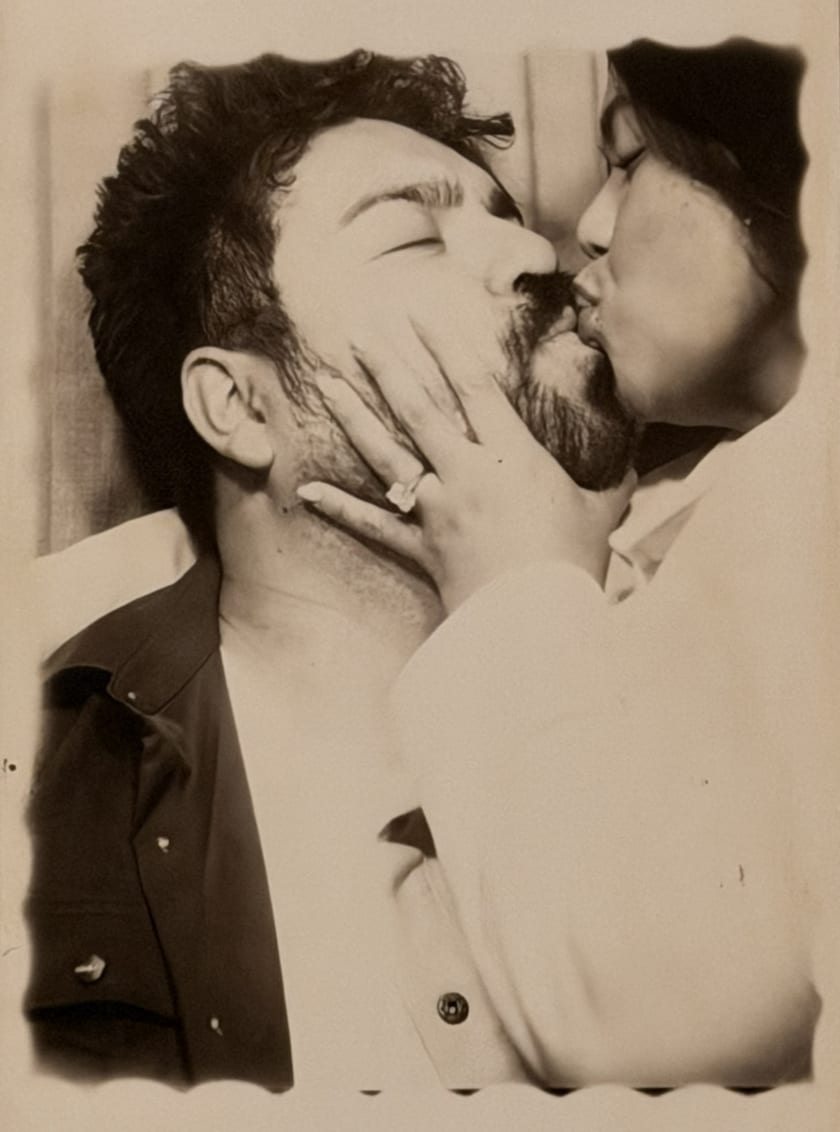 Sepia photobooth portrait of Ann and Chris posing playfully