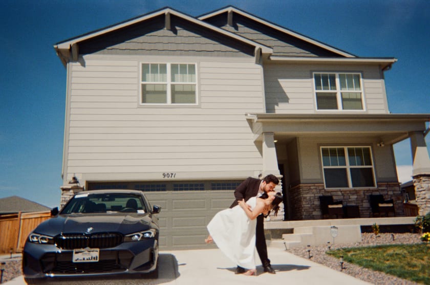 Film photo: a dip kiss on the driveway