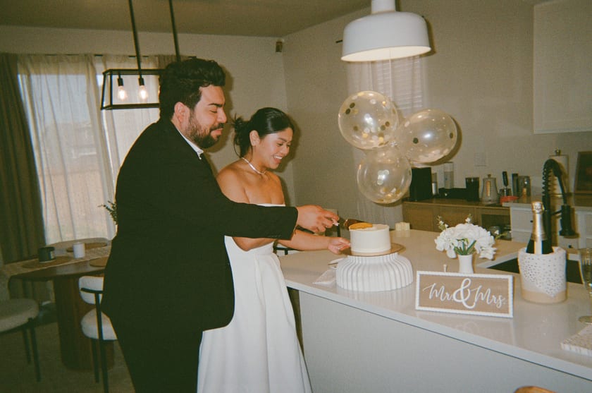 Film photo: cutting the cake together