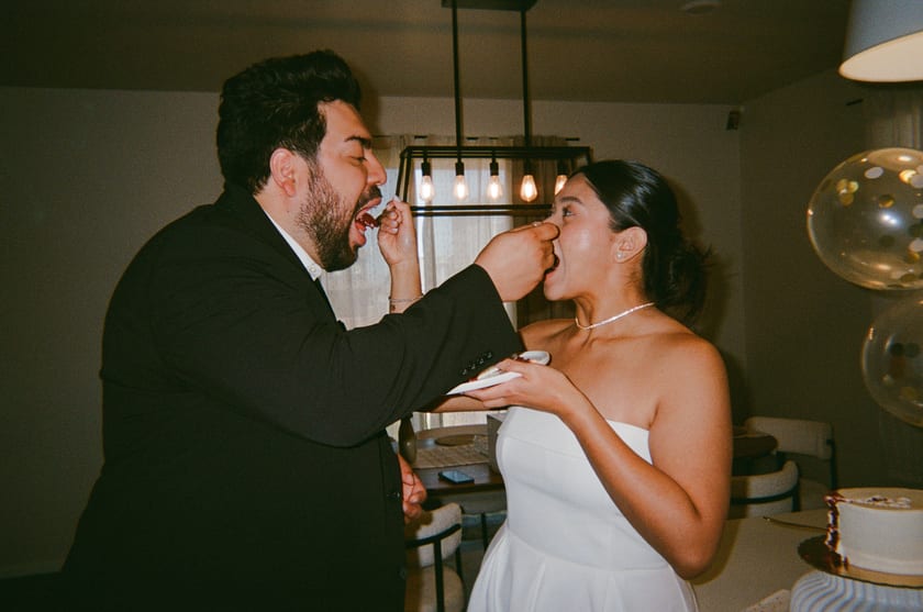 Film photo: feeding each other cake, mostly successfully
