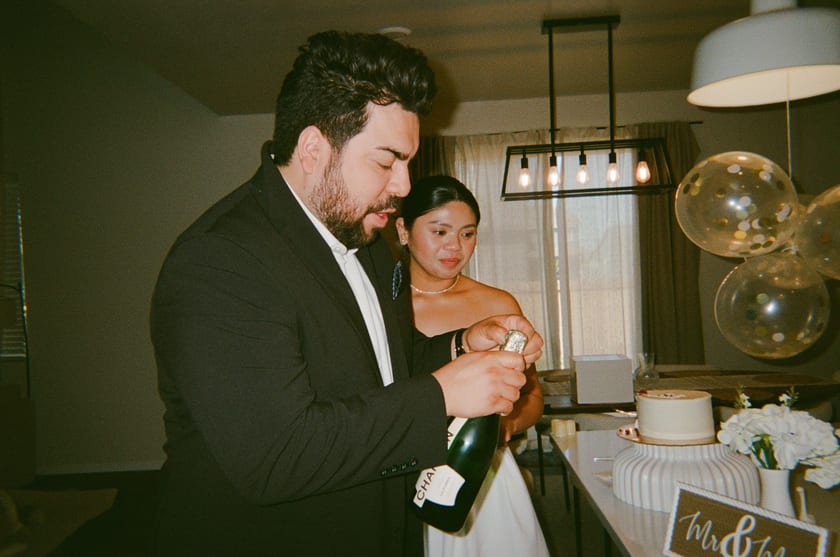 Film photo: opening the champagne together