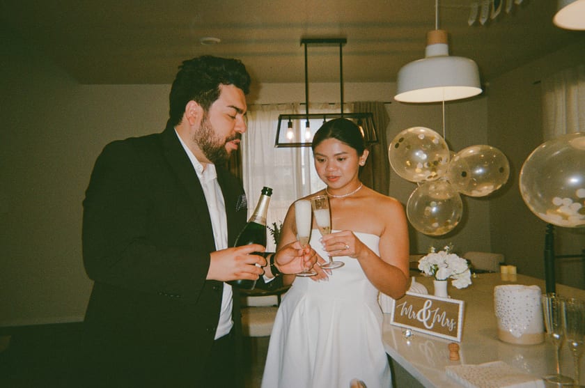 Film photo: a toast beneath the balloons