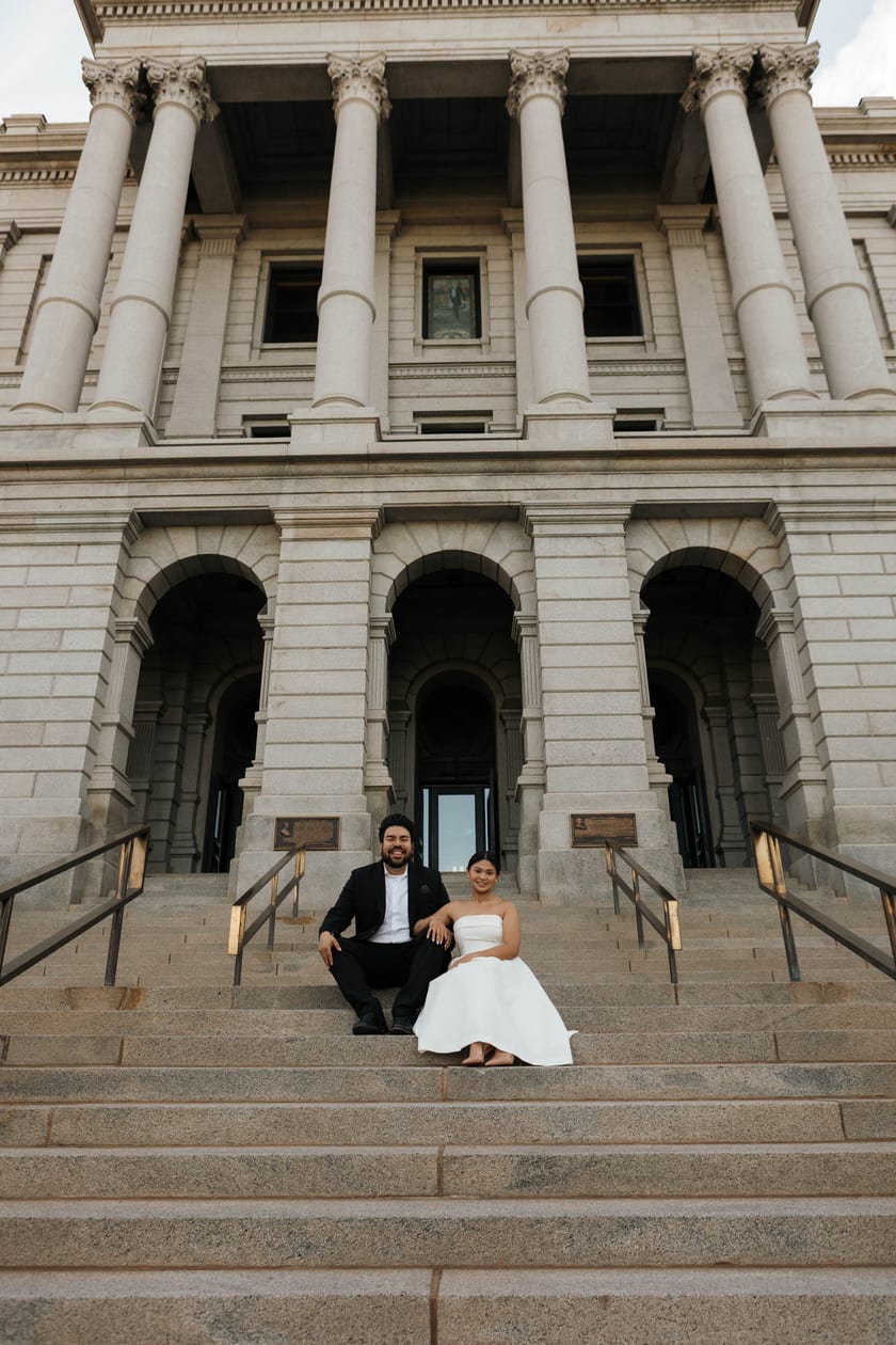 Seated together on the steps beneath the Capitol's towering columns