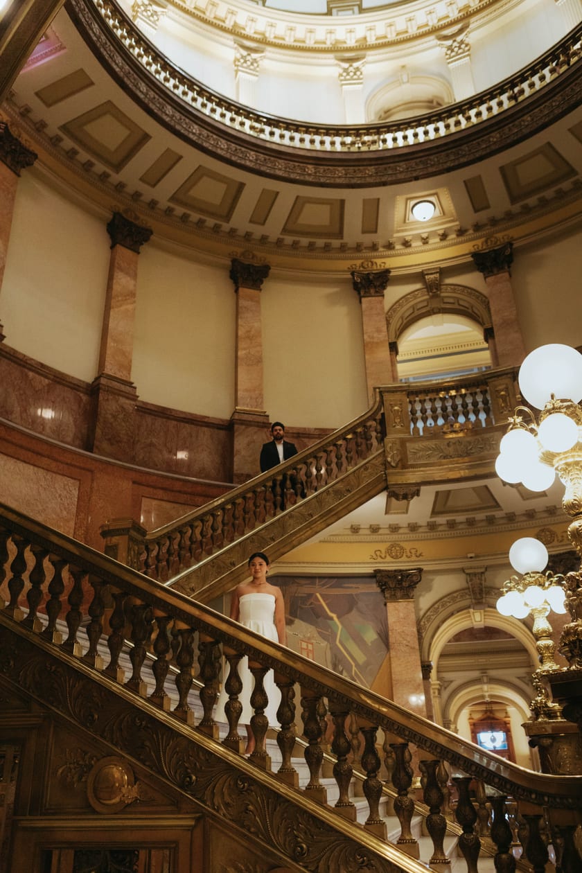 Beneath the rotunda: the grand staircase and gilded balconies of the Capitol interior